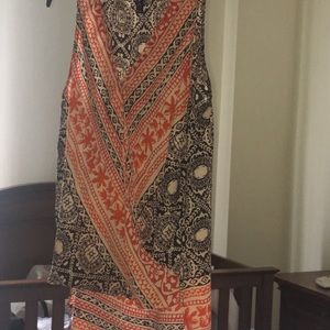 Aqua sleeveless high low top.